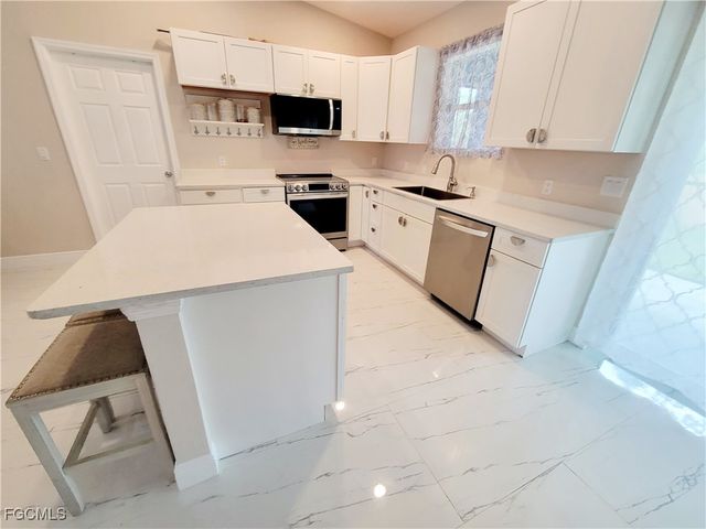 1138 Jaguar BLVD, Lehigh Acres, FL 33974