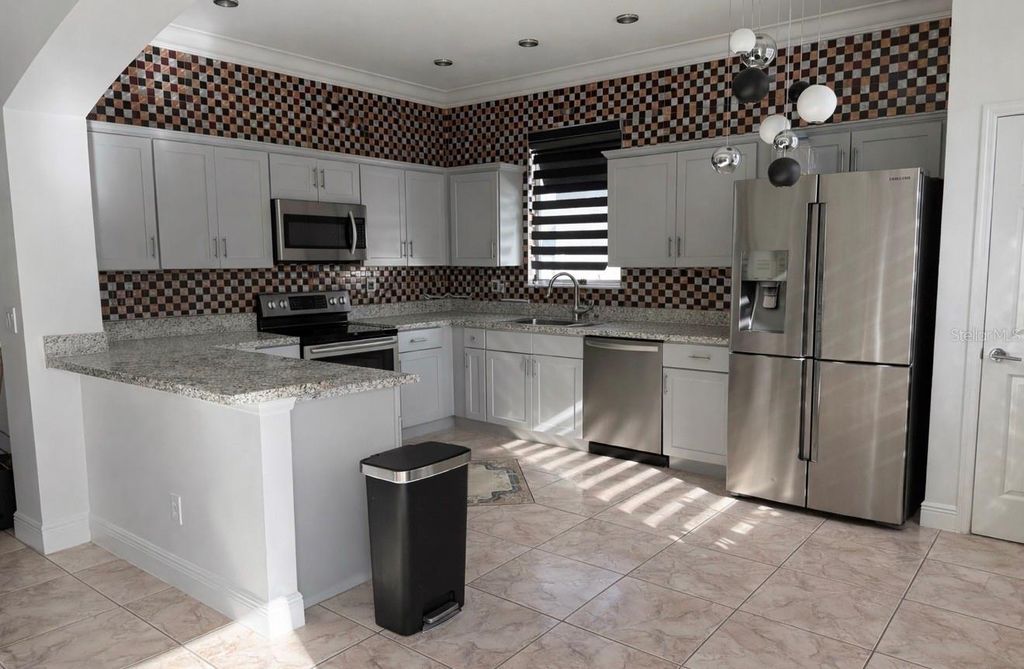 Image 9 of property listing at 13851 AMBERLEIGH ROAD, Orlando, FL 32837