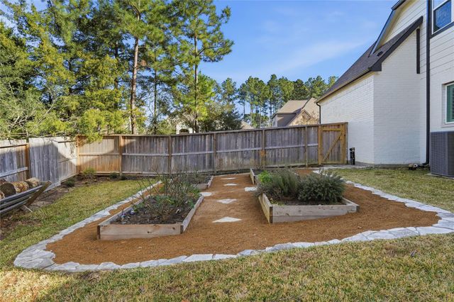 318 Calmato Woods Way, Conroe, TX 77318