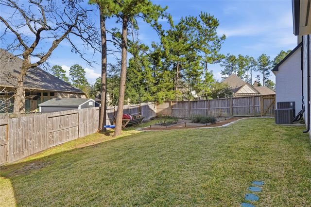 318 Calmato Woods Way, Conroe, TX 77318