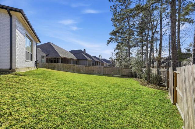 318 Calmato Woods Way, Conroe, TX 77318