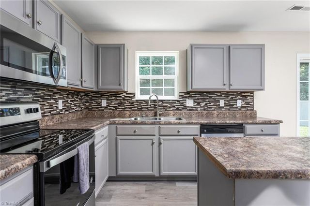 6623 Glenville Drive, Whitsett, NC 27377