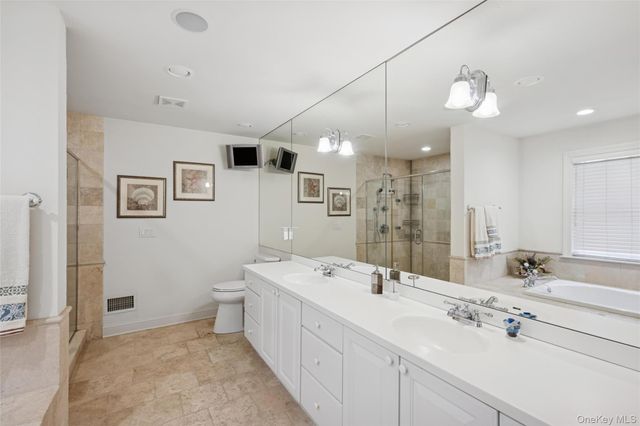 126 Malloy Drive, East Quogue, NY 11942