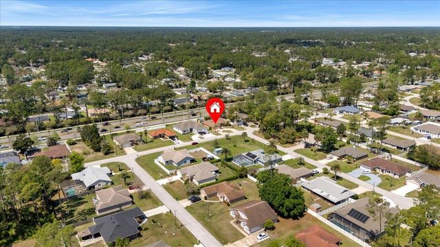 8 Point of Woods Drive, Palm Coast, FL 32164