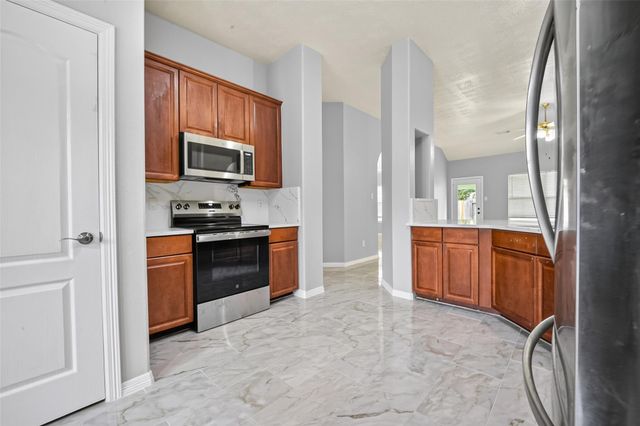 26106 Cypresswood Drive, Spring, TX 77373