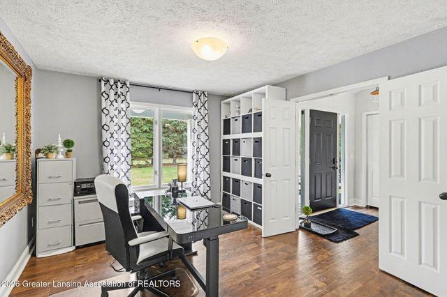 8573 W Lakeshore Drive, Perry, MI 48872