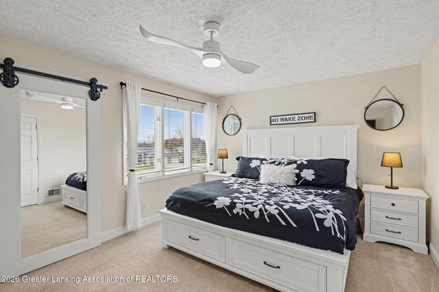 8573 W Lakeshore Drive, Perry, MI 48872