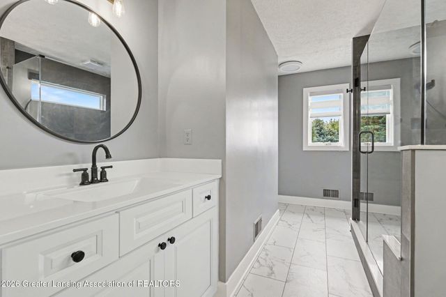 8573 W Lakeshore Drive, Perry, MI 48872