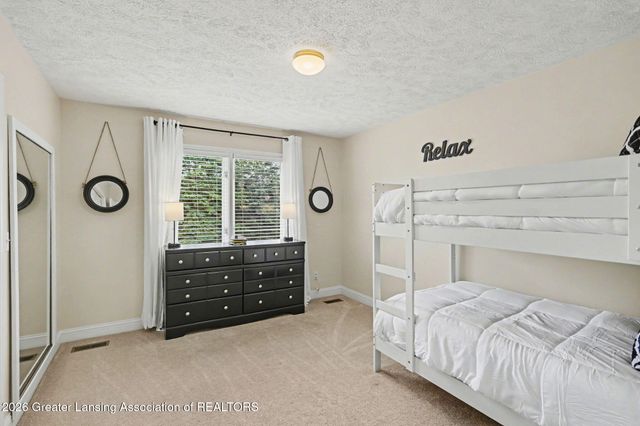 8573 W Lakeshore Drive, Perry, MI 48872