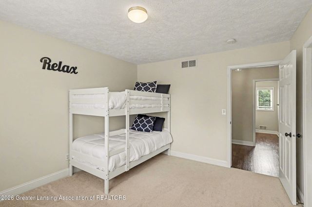 8573 W Lakeshore Drive, Perry, MI 48872