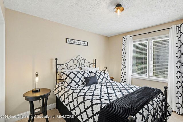 8573 W Lakeshore Drive, Perry, MI 48872