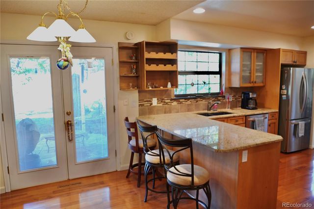3040 S Roslyn Street, Denver, CO 80231