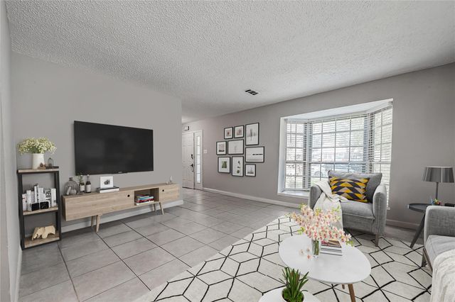 8619 Quail Burg Lane, Houston, TX 77489