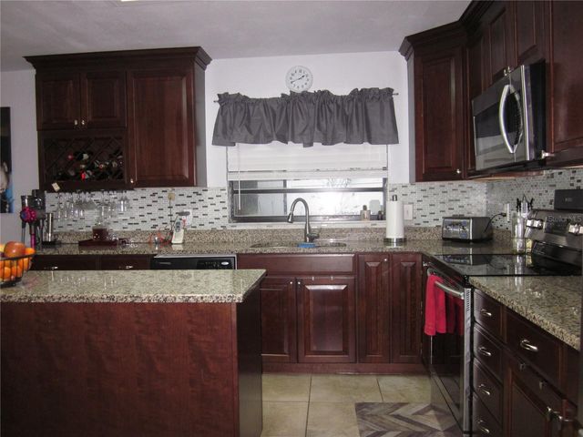 4902 COUNTRY AIRE LANE, Tampa, FL 33624
