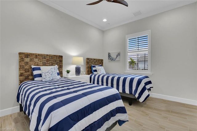 7110 Cayo Coco LN, Naples, FL 34113