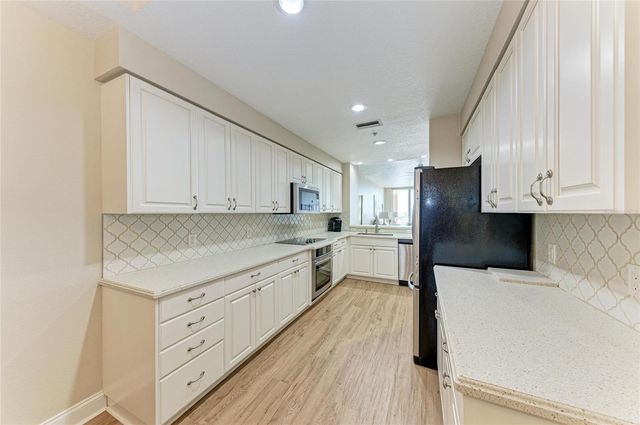 610 RIVIERA DUNES WAY 404, Palmetto, FL 34221