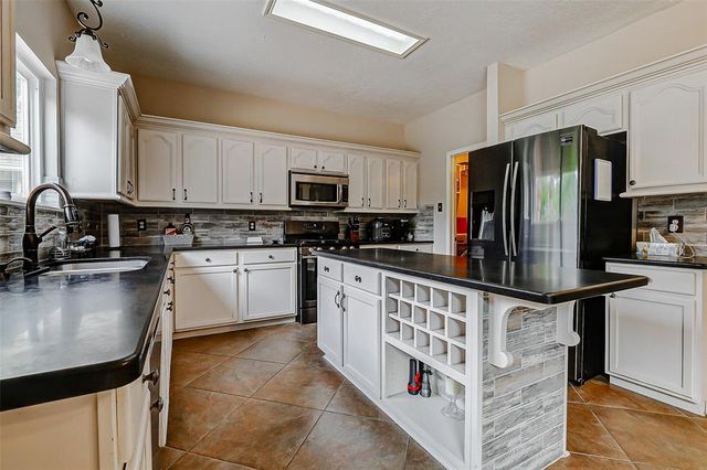 1603 Stoney Park Drive, Kingwood, TX 77339