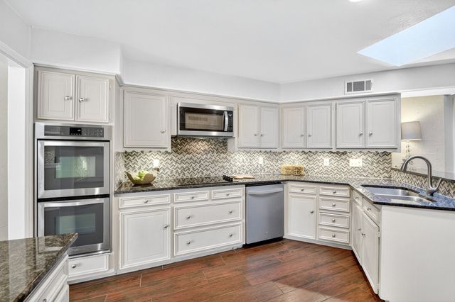 7235 Whispering Pines Drive, Dallas, TX 75248