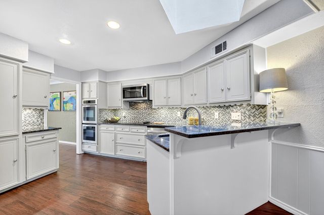 7235 Whispering Pines Drive, Dallas, TX 75248