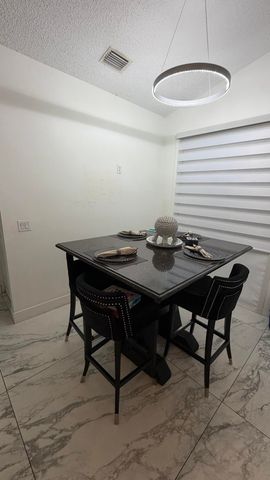 132 NOTTINGHAM Road, Royal Palm Beach, FL 33411