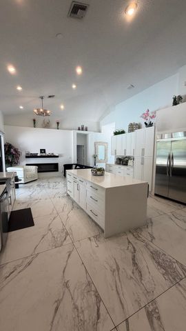 132 NOTTINGHAM Road, Royal Palm Beach, FL 33411
