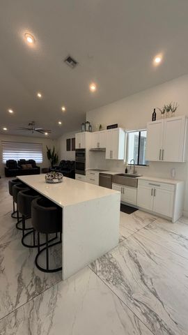 132 NOTTINGHAM Road, Royal Palm Beach, FL 33411