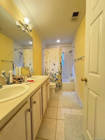 103 Sunflower Ridge Road, South Setauket, NY 11720