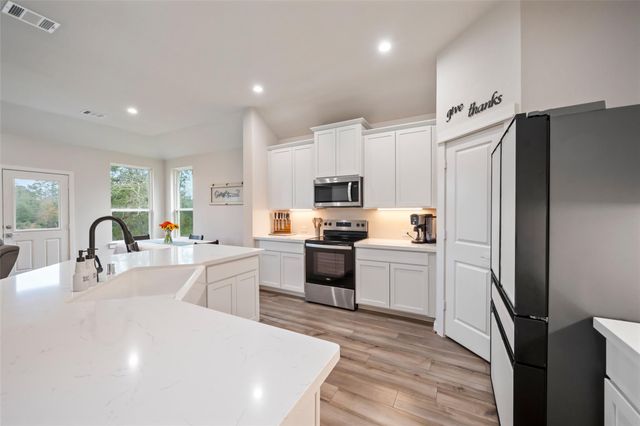 11755 Oakwood Ranch Drive, Willis, TX 77378