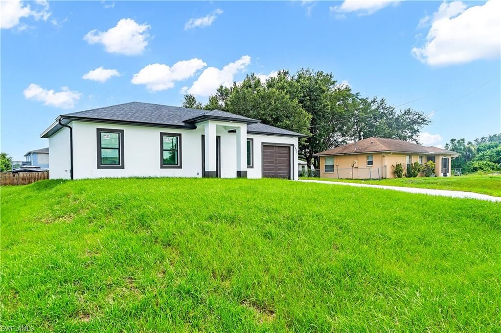 2923 2nd ST SW, LEHIGH ACRES, FL 33976 — photo 4