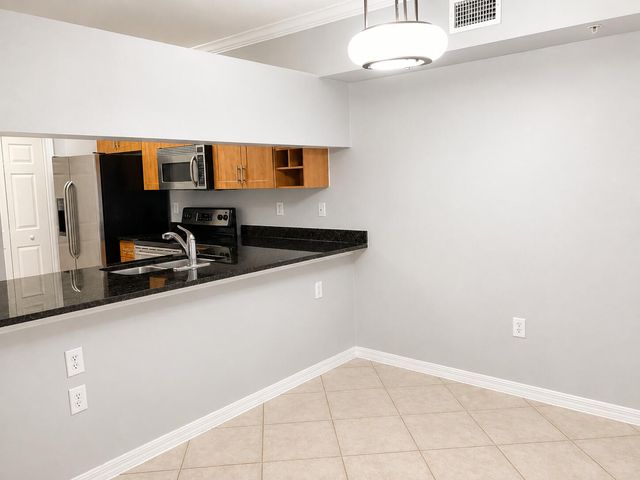 6521 Emerald Dunes Drive 206 + Garage, West Palm Beach, FL 33411