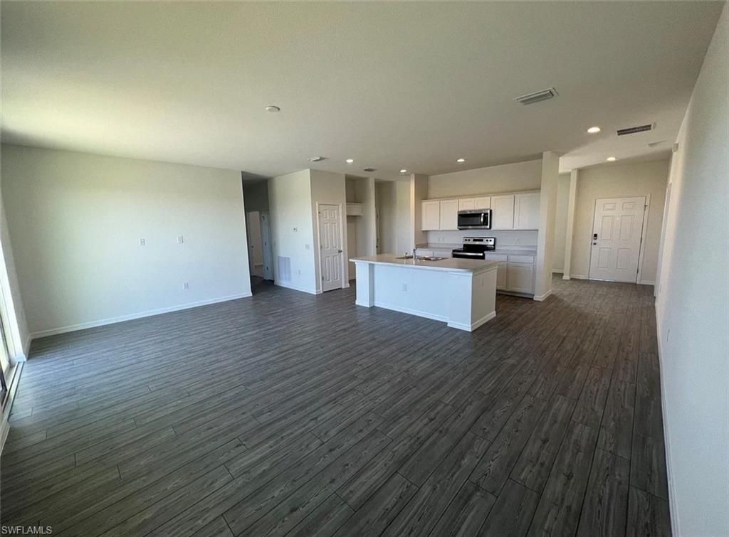 Image 3 of property listing at 916 NW 3rd AVE, Cape Coral, FL 33993