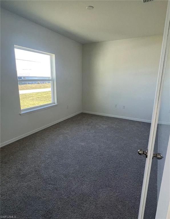 Image 5 of property listing at 916 NW 3rd AVE, Cape Coral, FL 33993