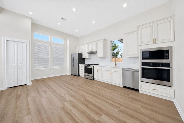 9627 Champion Heavens Drive, Spring, TX 77379
