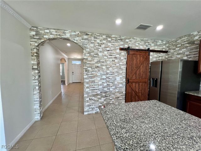 10293 Silver Pond LN, Lehigh Acres, FL 33936