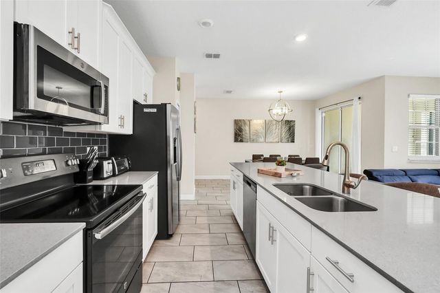 1571 PLUNKER DRIVE, Davenport, FL 33896