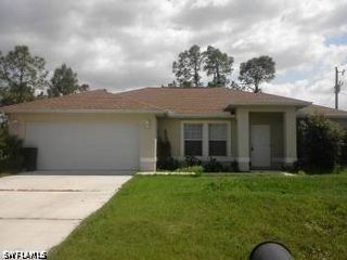 1407 W 10th ST, Lehigh Acres, FL 33972