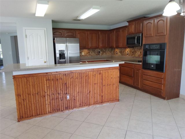 3055 ANQUILLA AVENUE, Clermont, FL 34711