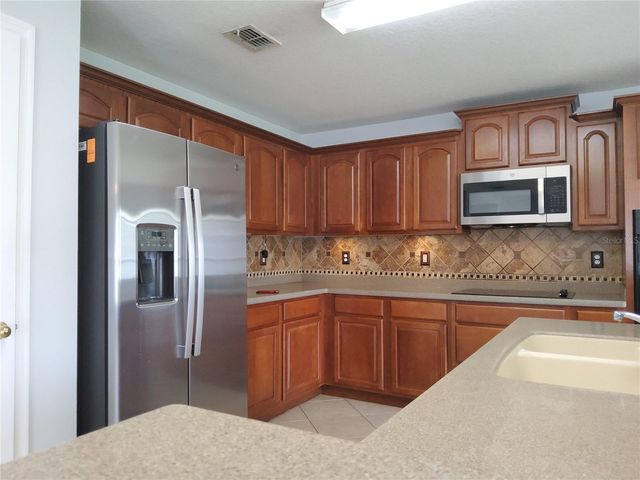 3055 ANQUILLA AVENUE, Clermont, FL 34711