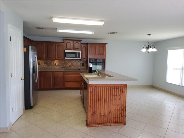 3055 ANQUILLA AVENUE, Clermont, FL 34711