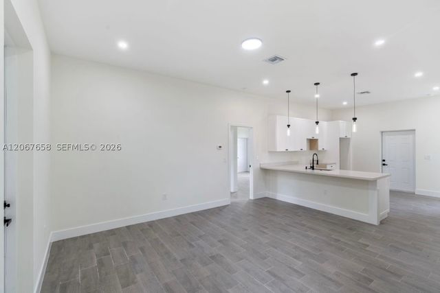 710 Peacock Ave, Lehigh Acres, FL 33974