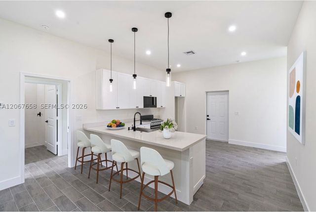 710 Peacock Ave, Lehigh Acres, FL 33974