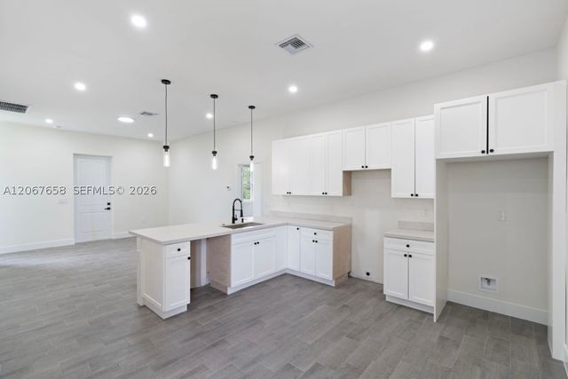 710 Peacock Ave, Lehigh Acres, FL 33974