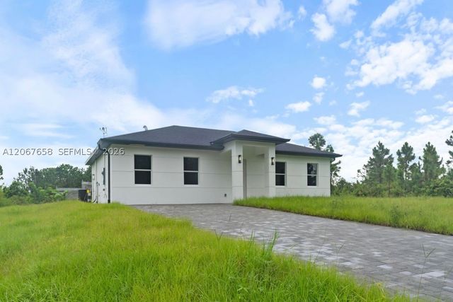 710 Peacock Ave, Lehigh Acres, FL 33974