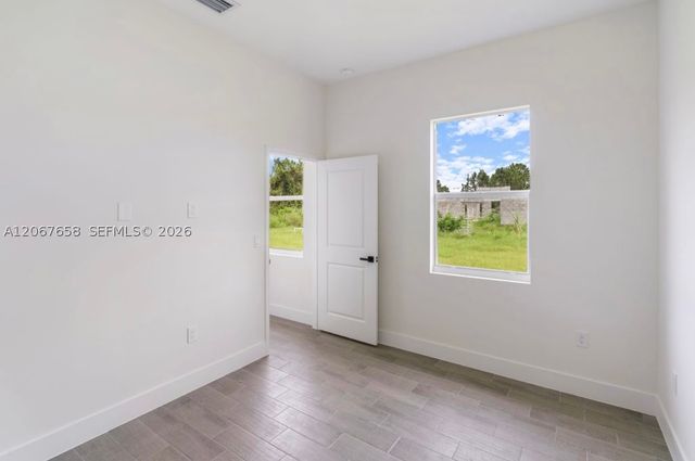 710 Peacock Ave, Lehigh Acres, FL 33974