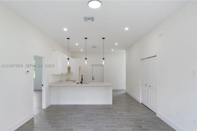 710 Peacock Ave, Lehigh Acres, FL 33974