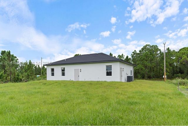 710 Peacock Ave, Lehigh Acres, FL 33974