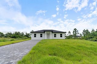 710 Peacock Ave, Lehigh Acres, FL 33974