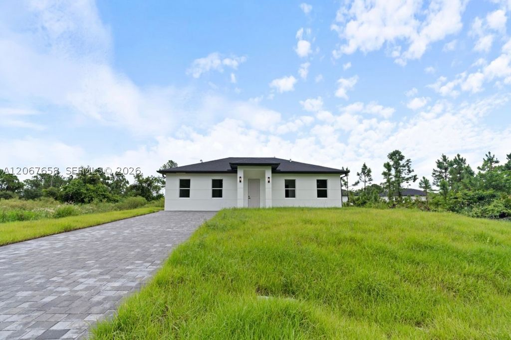 710 Peacock Ave, Lehigh Acres, FL 33974