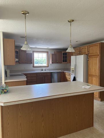 7360 S Tripp, Osseo, MI 49266