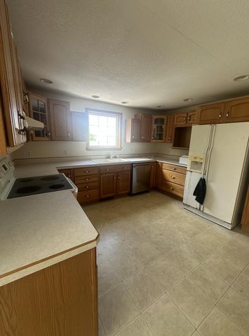 7360 S Tripp, Osseo, MI 49266